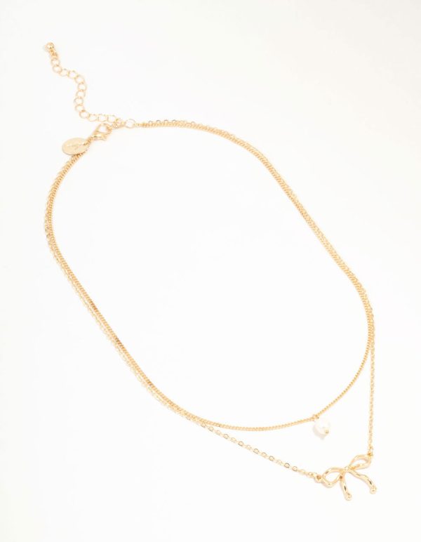 Gold Pearl & Bow Layered Necklace For Sale - Image 2