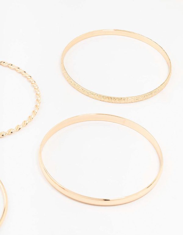 Gold Twisted Bangle Bracelets 4-Pack Fashion - Image 3