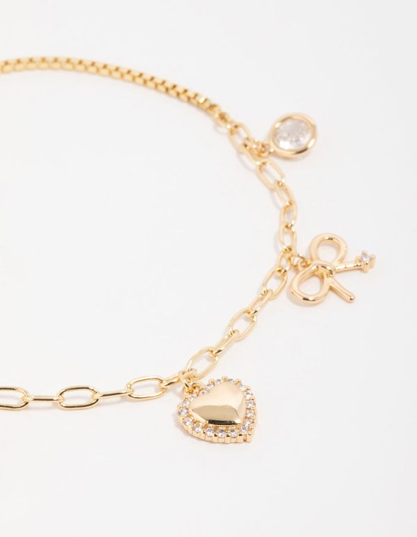 Gold Plated Brass Cubic Zirconia Heart & Bow Charm Bracelet For Cheap - Image 2